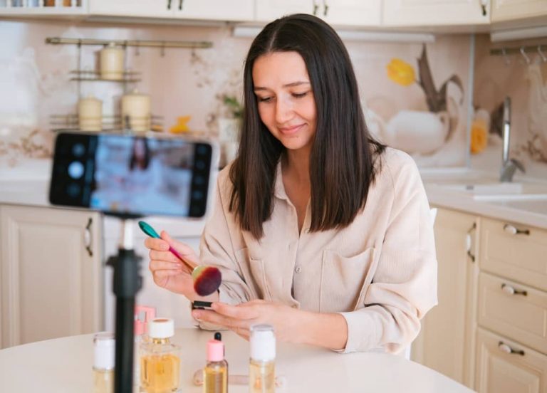 woman taking photos for cosmetic products with a phone